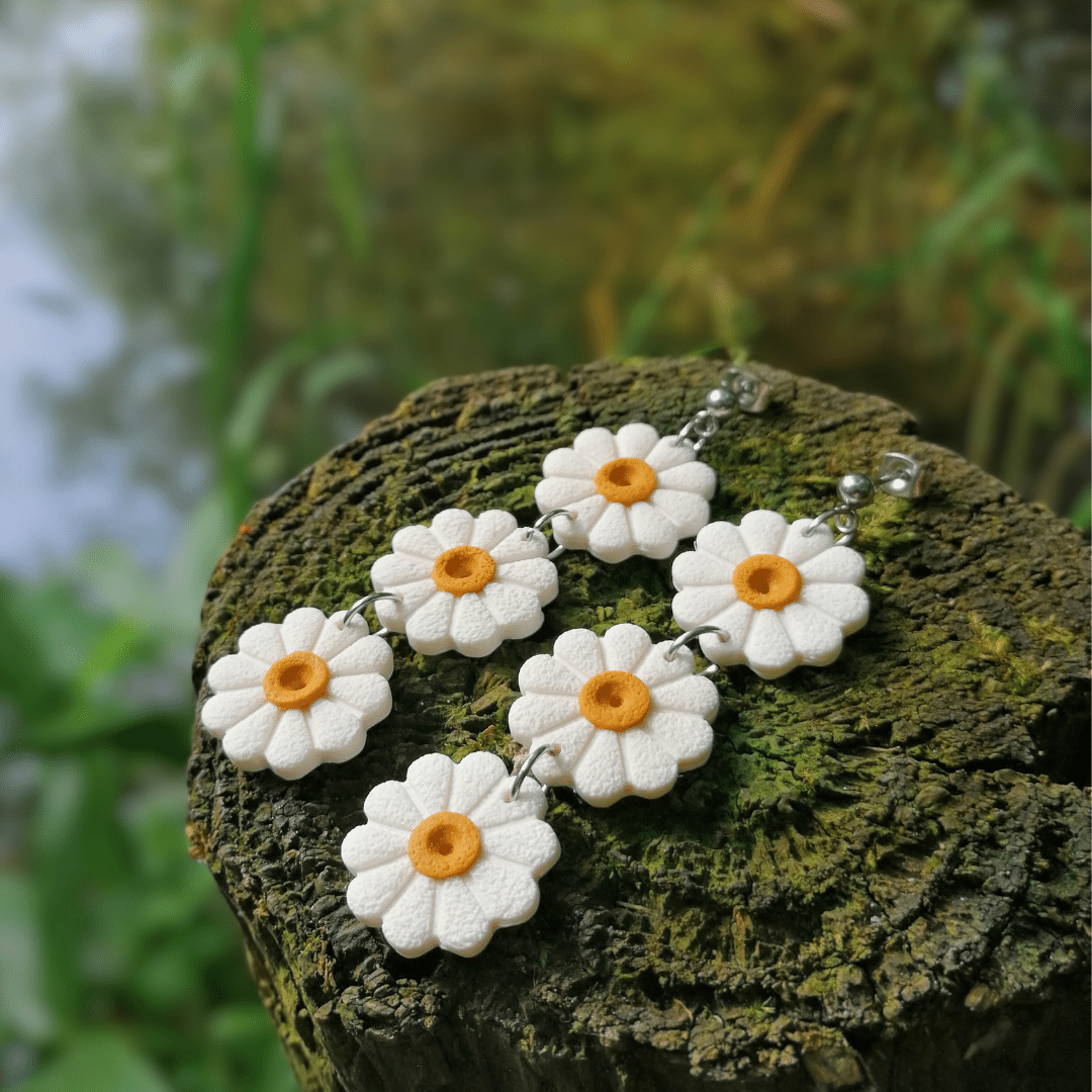 Close up of our Statement Daisy Chain Drop Studs, hand Crafted in Dorset using Polymer Clay.