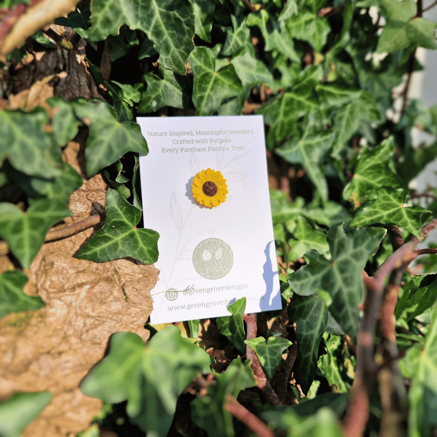  Intricate and detailed polymer clay Sunflower pin hand crafted in Dorset with nature background.