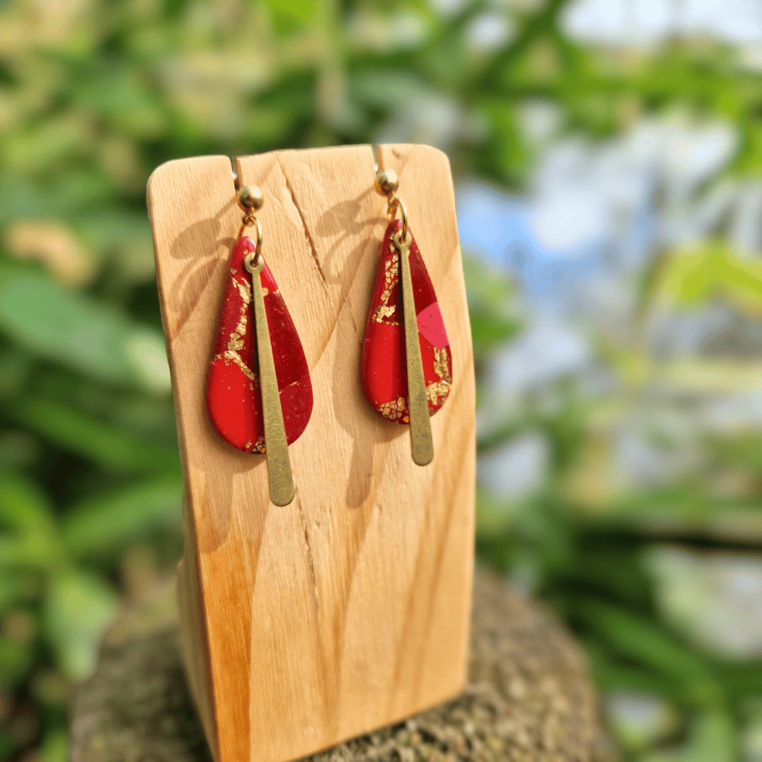 Close up Detail Image of the Zero Waste Red and Gold Long Teardrop Drop Studs.
