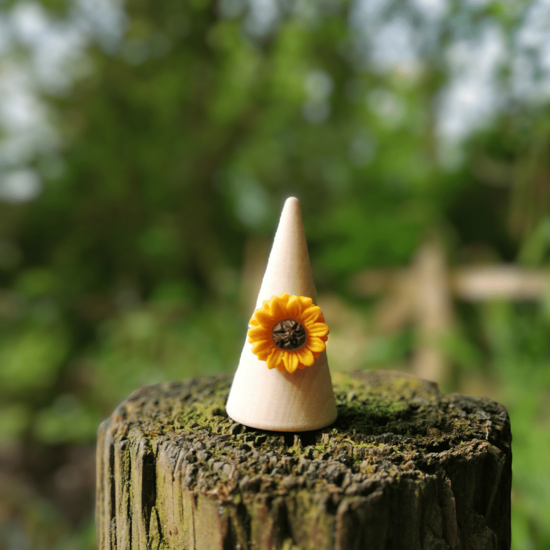 Front view of our adjustable Sunflower ring with intricate petals.