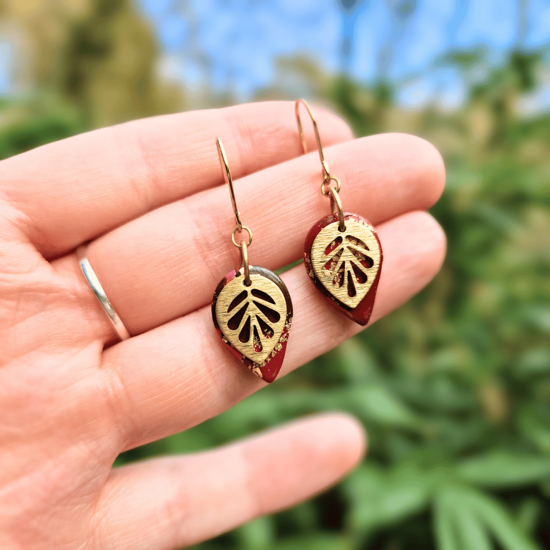 Scale Image for Option 2 of the Reds and Gold Zero Waste Tear Leaf Earrings with Nature Background in Dorset.