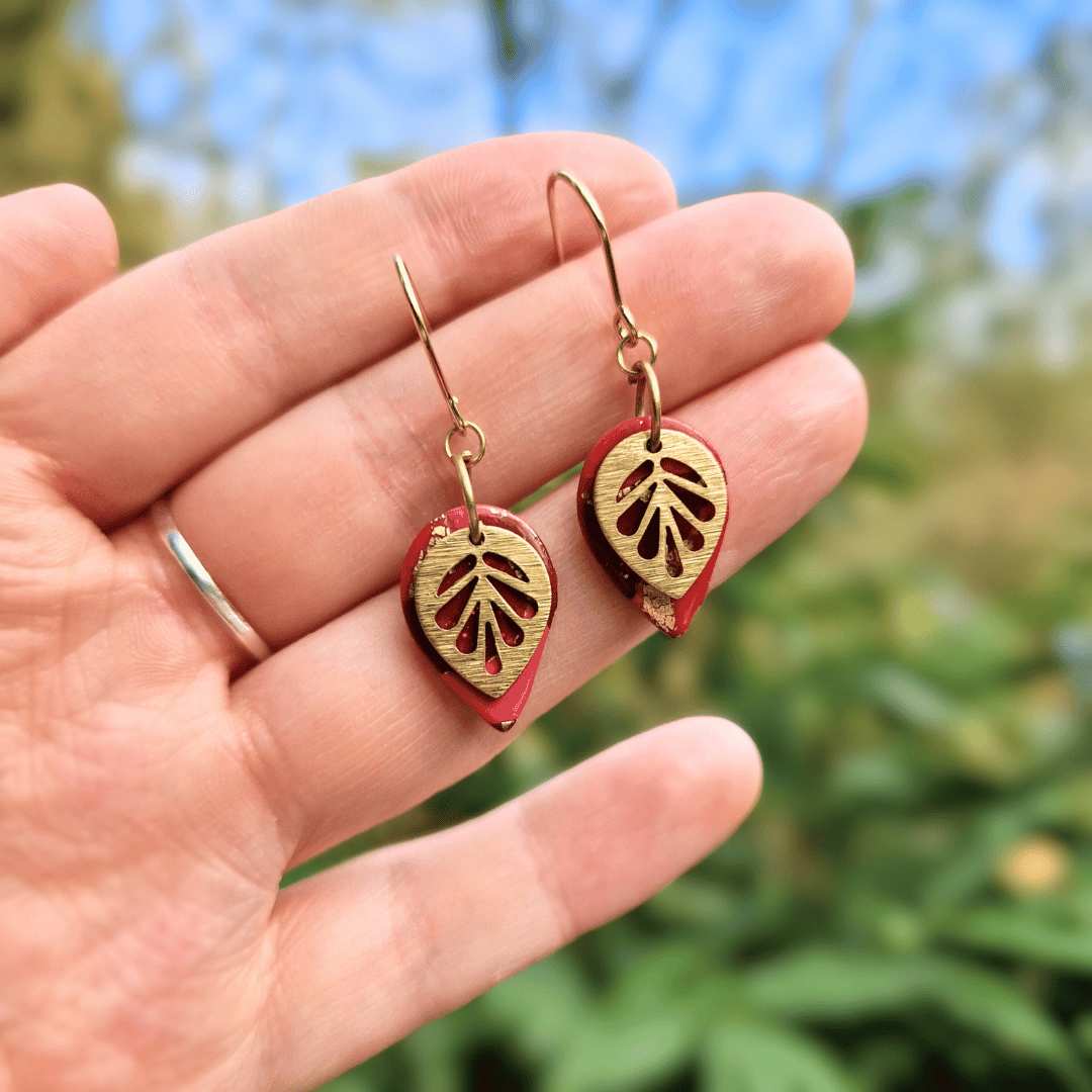 Scale Image of the Tear Leaf Earrings Hand Crafted in Dorset using polymer Clay with Nature Background.